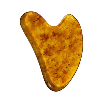 CARELIKA Amber Gua Sha Scraper – product photo on white background